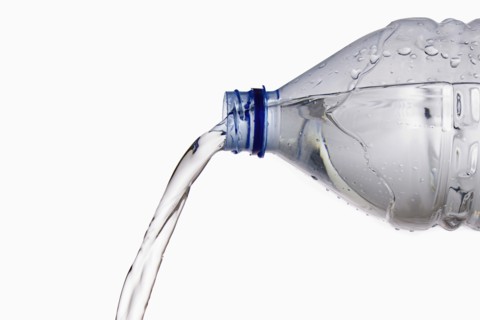 Pouring Cold Water from Bottle