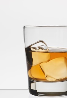 Studio shot of glass of whiskey. Photo : Daniel Grill