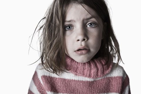 Powerful Shot of a Messy and Timid Child