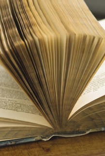 Close up of pages in antique open book.