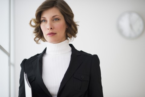 Portrait of businesswoman in office.
