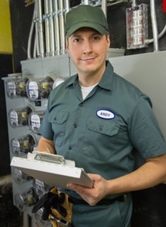 Electrician controlling electric meters.