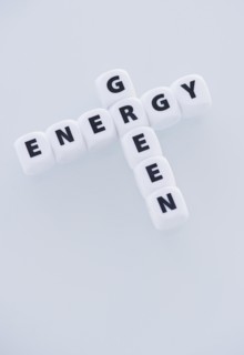 Studio shot of dice spelling out green energy. Photo: Daniel Grill