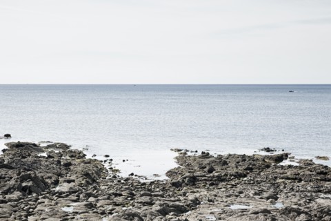 France, Brittany, Rocky beach and ocean. Photo: Jon Boyes