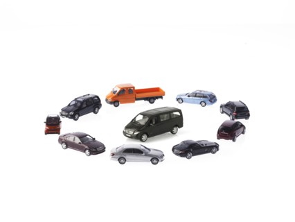 Circle of different cars on white background. Photo: David Arky