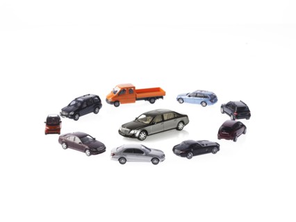 Circle of different cars on white background. Photo: David Arky