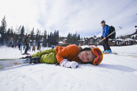 USA, Montana, Whitefish, Girl (8-9) skiing with her mother. Photo: Noah Clayton