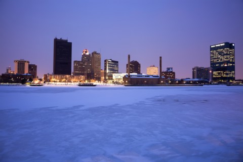 USA, Ohio, Toledo skyline across frozen river, dusk. Photo: Henryk Sadura