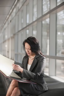 Businesswoman text-messaging. Photo: Mark Edward Atkinson
