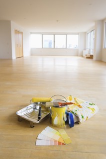 Home improvement equipment in empty apartment.