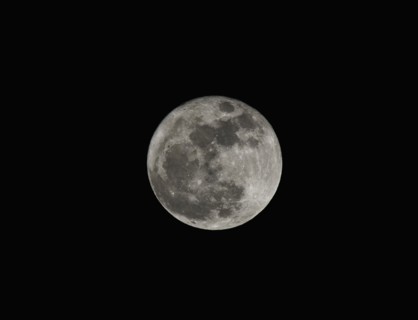 Full moon against night sky.