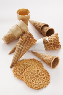 Close up of empty ice cream cones and wafers.
