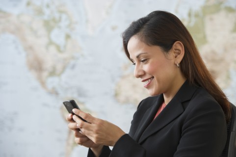 Woman using PDA.