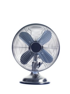 Electric fan on white background. Photo : David Arky