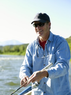 USA, Colorado, Mature man fly-fishing. Photo : John Kelly