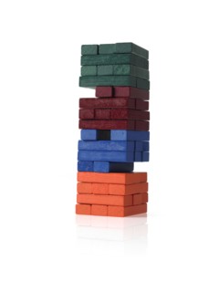 Studio shot of colorful wooden jenga blocks. Photo : David Arky
