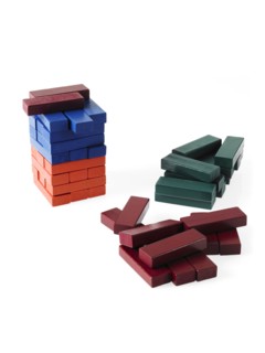 Studio shot of colorful wooden jenga blocks. Photo : David Arky