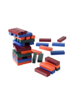 Studio shot of colorful wooden jenga blocks. Photo : David Arky