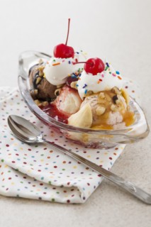 Close up of ice cream dessert with colorful topping.