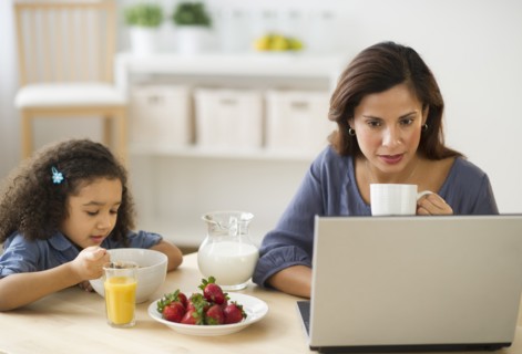 Mother and daughter (6-7) during breakfast.