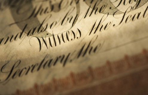 Close up of stock certificate.