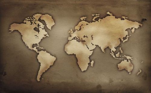 Close up of antique world map.