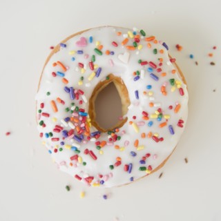 Close-up of sprinkled donut. Photo : Jamie Grill Photography