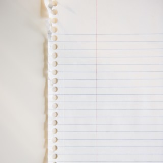 Studio shot of lined paper. Photo : Jamie Grill Photography