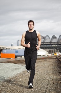 USA, Washington, Seattle, man jogging. Photo : Take A Pix Media