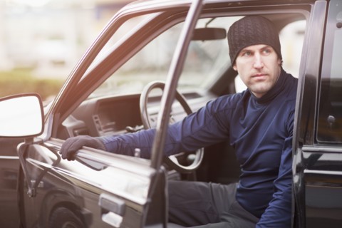 Man in workout wear getting out of truck. Photo : Take A Pix Media