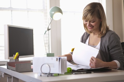 Woman working in office. Photo : DreamPictures