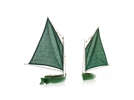 Two toy boats on white background. Photo: David Arky