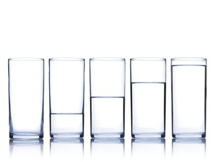 Studio shot of glasses of water in row. Photo : David Arky