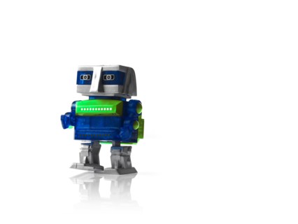Toy robot on white background. Photo : David Arky