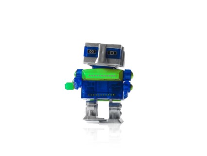 Toy robot on white background. Photo : David Arky