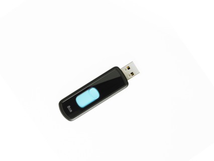 USB stick on white background. Photo : David Arky
