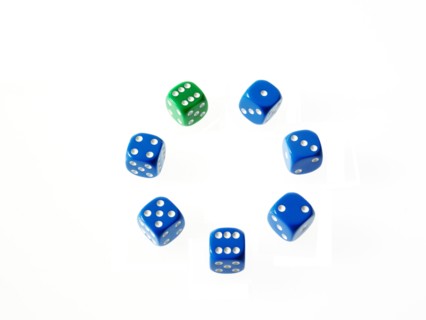 Dice on white background. Photo : David Arky