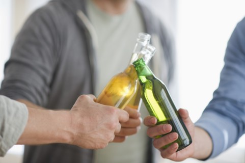 Men toasting with beer.