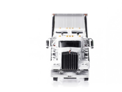 Studio shot of white toy truck. Photo : David Arky