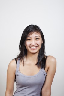 Portrait of cheerful young woman. Photo : Winslow Productions