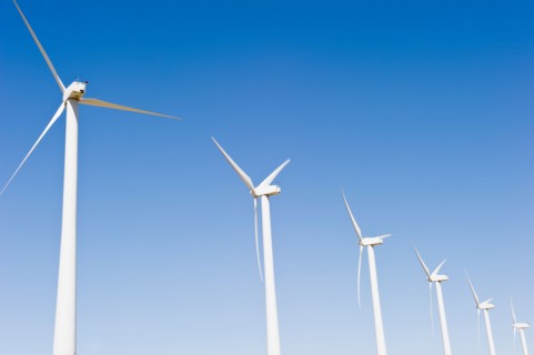 USA, California, Palm Springs, Coachella Valley, San Gorgonio Pass, Wind turbines against blue sky.