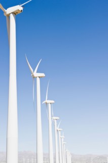 USA, California, Palm Springs, Coachella Valley, San Gorgonio Pass, Wind turbines against blue sky.