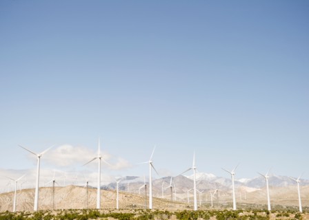 USA, California, Palm Springs, Coachella Valley, San Gorgonio Pass, Wind turbines with mountains in