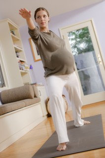 Expectant mother exercising. Photo : Rob Lewine