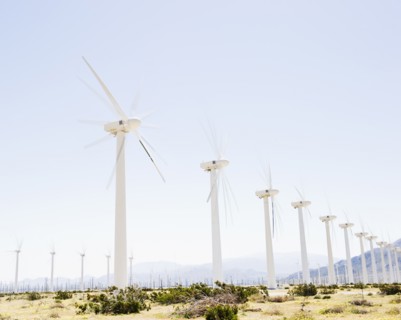 USA, California, Palm Springs, Coachella Valley, San Gorgonio Pass, Wind turbines with mountains in