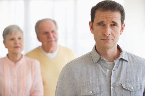 Senior parents with adult son.