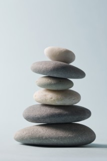 Studio shot of rocks balancing on one another. Photo : Chris Hackett