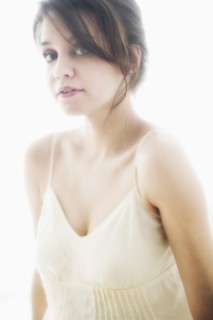 Studio portrait of young woman.