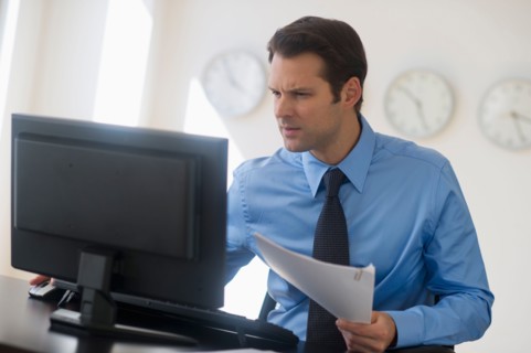 Businessman working on computer.