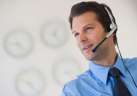 Portrait of male customer service representative.